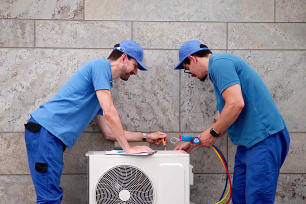 istock Hispanic Male HVAC Technician Performing Commercial HVAC Installation 2224774627