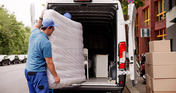 istock The Happy Hispanic Movers Loading Mattresses Into Delivery Truck 2224774648