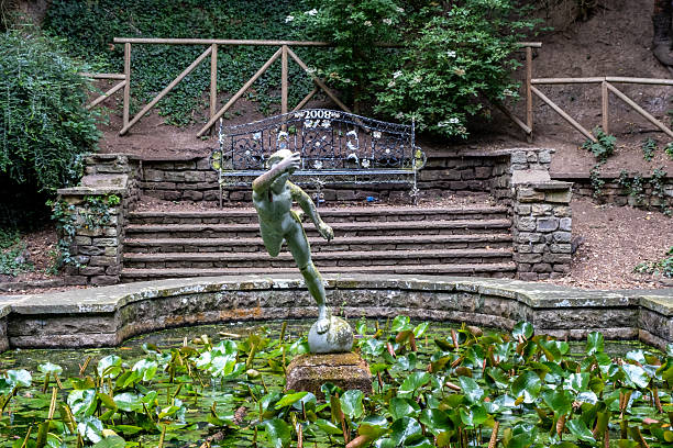 Statue in a lily pond in Peasholm Park in the coastal town of Scarborough, North Yorkshire