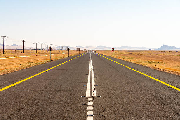 Drive on the beautiful scenic road between Riyadh and AlUla, through a landscape of sand desert, rock formations and mountains, in Saudi Arabia