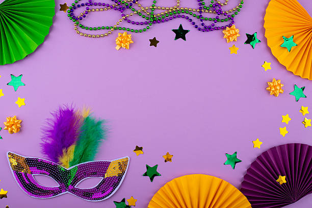 istock Vibrant Mardi Gras background with mask, beads, and festive decorations 2224780305