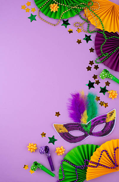 istock Vibrant Mardi Gras background with mask, beads, and festive decorations 2224780310