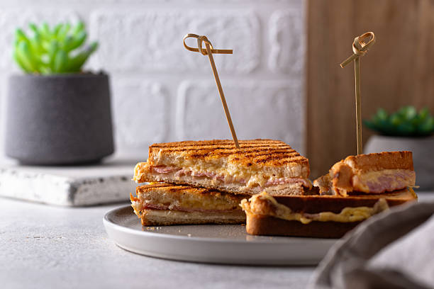 istock Grilled sandwich with ham and melted cheese 2224780344