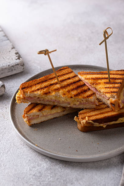istock Grilled sandwich with ham and melted cheese 2224780350
