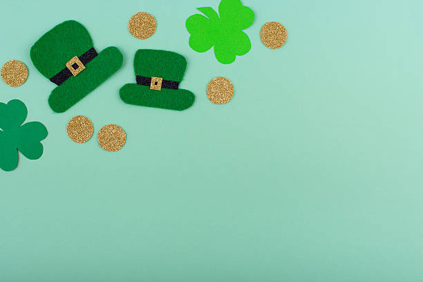 istock St. Patrick's Day concept with leprechaun hat, gold coins and horseshoe 2224780946
