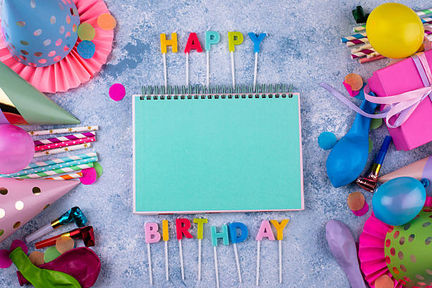 Happy birthday celebrating background with party items and candles