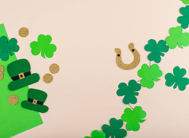 istock St. Patrick's Day concept with leprechaun hat, gold coins and horseshoe 2224781195