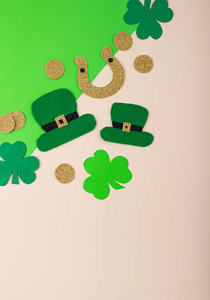 istock St. Patrick's Day concept with leprechaun hat, gold coins and horseshoe 2224781268