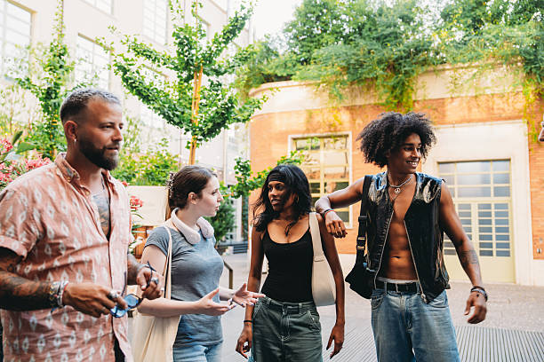 istock Diverse Young Adults Engaging in Outdoor Conversation 2224783604