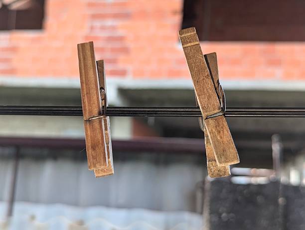 Wooden clothes clips on a clothes line in Trinidad and Tobago. Wet or washed clothes or clothing are usually hung on these lines with the clips.