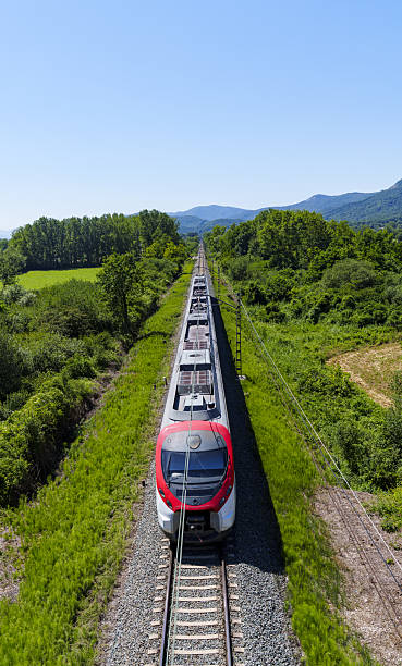 Train traveling at high speed on a straight line in Navarra, Spain