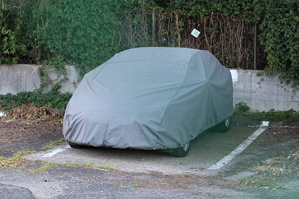 istock Large gray plastic garbage bag placed on concrete ground near urban building wall 2224791213