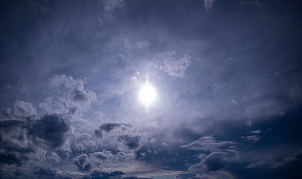 istock Sun shines over a beautiful cloud formation 2224794583