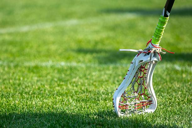 istock Lacrosse Stick on Green Field 2224794897