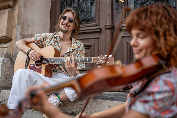istock Street Musicians Performing Together in an Urban Setting Creating Harmony 2224802247