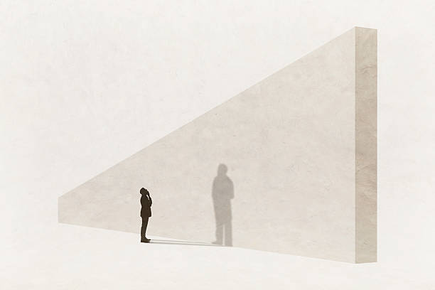 istock Businessman Looking Up At Tall Wall 2224803114