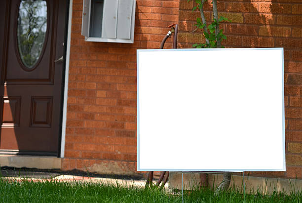istock A blank banner sign on yard 2224804743