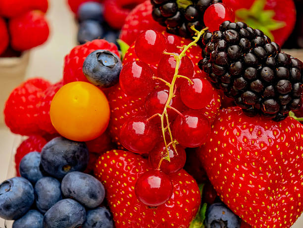 Colorful Berry Medley: Fresh Strawberries, Blueberries, and Blackberries for a Vibrant High-Resolution Background Ideal for Wallpaper