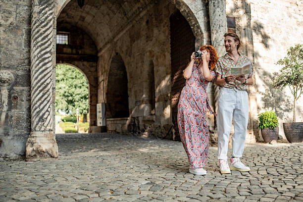 istock Young Tourists Exploring Historical Location Together on a Sunny Day 2224814598