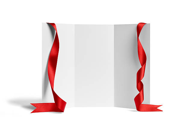 istock folded leaflet red ribbon bow paper template book desktop calendar 2224817717
