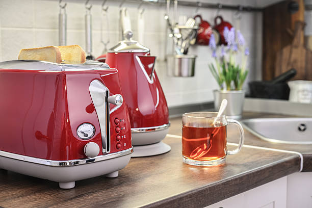 istock Red electric kettle and toaster  in retro slile 2224822619