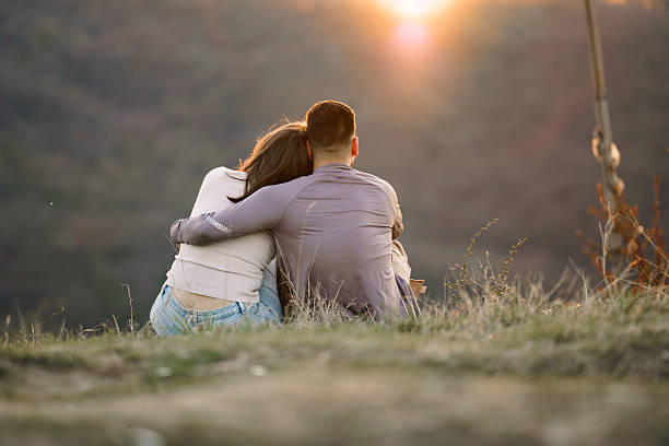 istock Rear view of a couple hugging. 2224822648