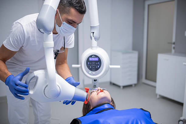 istock Dentist taking X-rays of patient. 2224836916