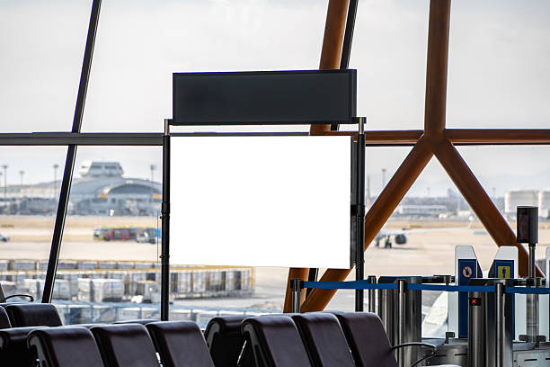 istock Wall hanging billboard white mockup screen for advertising with airport background. 2224844871