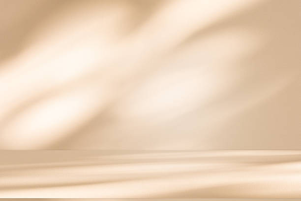 istock Studio style background wall decoration presentation uses white and beige tones. with shadows cast from a nearby window, concept creating a decorative 2224849311
