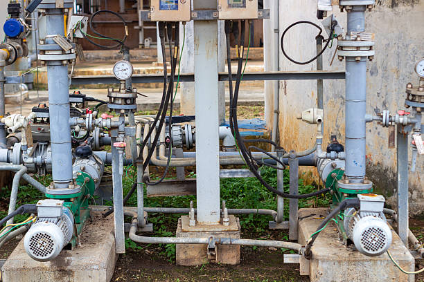 istock Complex industrial machinery and piping infrastructure in a utility setting depicting energy 2224853750