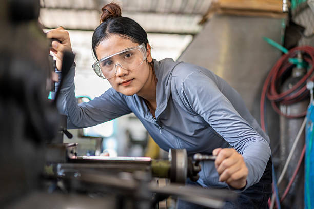 istock Skilled Asian Woman Machinist Working on a Lathe Machine in a Workshop 2224856783
