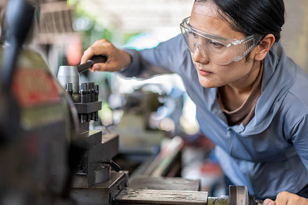istock Skilled Asian Woman Machinist Working on a Lathe Machine in a Workshop 2224856834