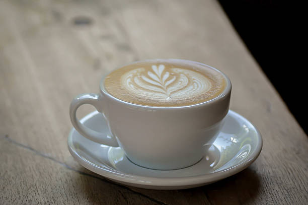 istock hot cofffee, cappuccino coffee or latte coffee or flat white or latte art 2224857961