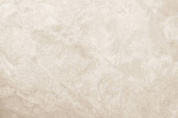 istock Colour old concrete wall texture background. Close up retro plain cream color cement wall background texture. 2224861715