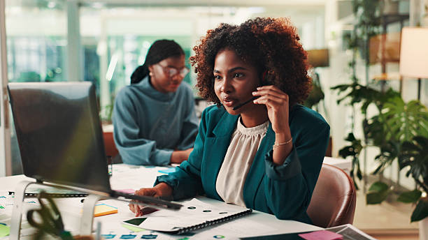 istock Call center, laptop and problem solving with black woman in office for assistance, consulting or help. Contact us, customer service and support with employee in workplace for crm or sales feedback 2224867436