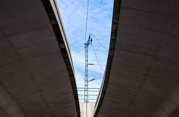 Lidkoping, Sweden - May 27, 2023: The red semi-circular railway bridge over the river Lidan in Lidkoping