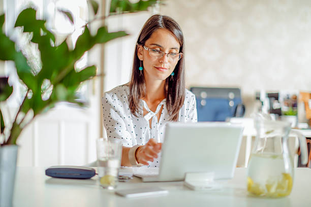 istock Young woman working in her offfice 2224871688