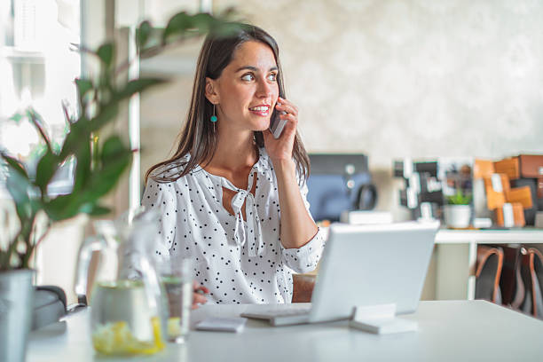 istock Young woman working in her offfice 2224871723