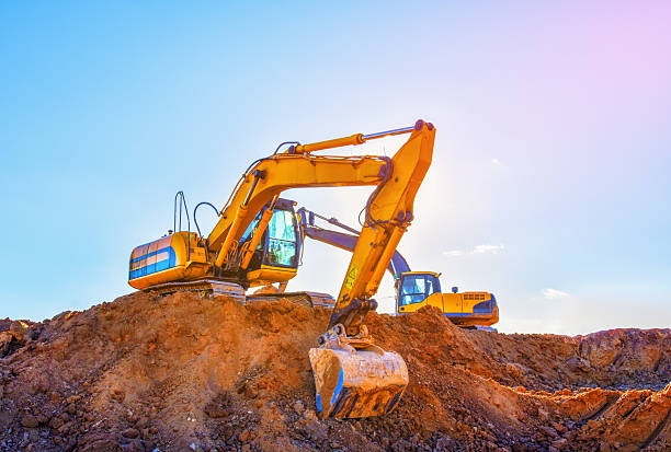 istock Excavator on earthmoving. Digger on construction site. Excavators moving soil. 2224872713