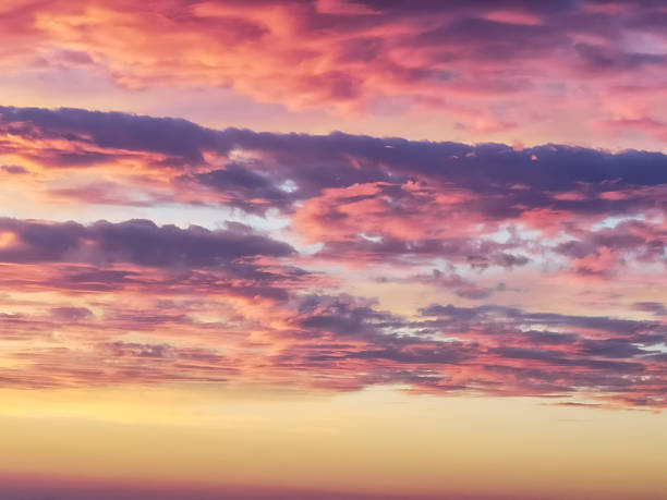 istock Textured Pink and Violet Clouds with Soft Golden Light, suitable for quotes, lyrics, and motivational backgrounds 2224875840