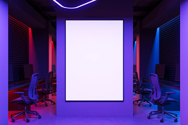 Futuristic workspace with glowing blank poster screen in neon-lit room featuring modern chairs and dual monitor stations in deep purple ambiance. 3D Rendering