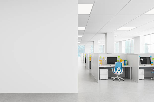 istock Empty white office wall with modern open space cubicles and clean layout suitable for poster mockup or advertising presentation concept. 3D Rendering 2224878194