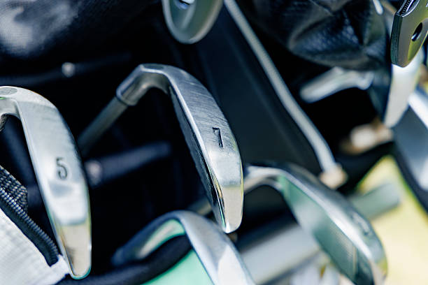 istock Well-worn golf clubs on a golf cart 2224883306