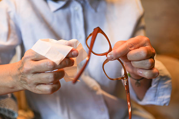 istock Elderly Woman Caring For Her Glasses 2224883524