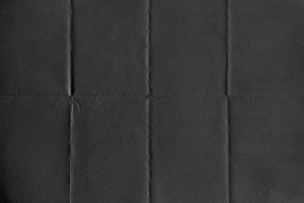 istock Black Textured Ragged Crumpled Paper Background 2224885008