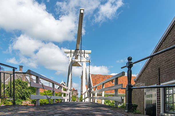 The so called Kwakelbrug from the 18th century, is one of many traditional drawbridges in the old town of Edam along the IJsselmeer in The Netherlands. 