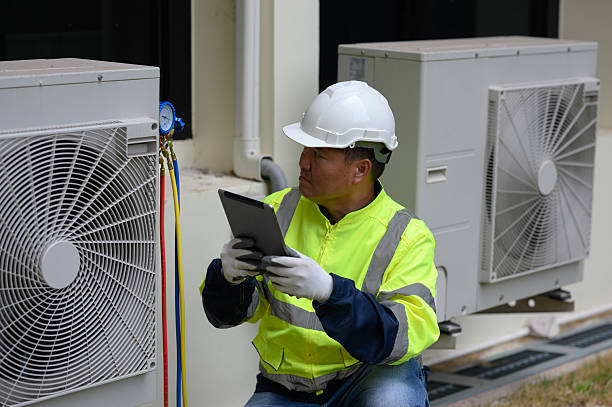 istock Technicians are checking the cooling system of the outdoor air conditioner. 2224893063