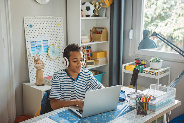 istock Teenage boy studding at home 2224893736