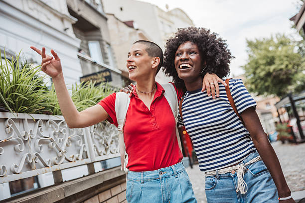 istock Young lesbian couple traveling 2224894233