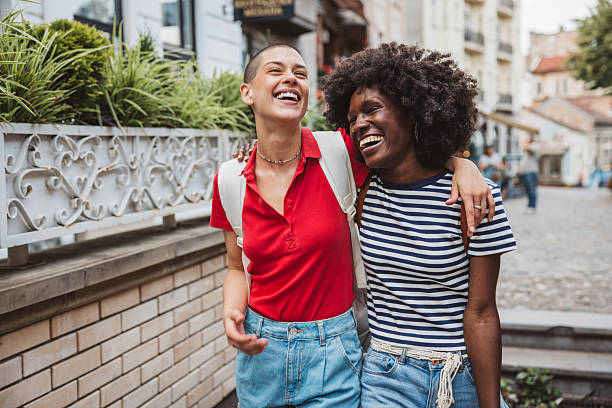 istock Young lesbian couple traveling 2224894234